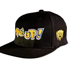 A black wool snapback baseball cap with embroidered Anime style One Up logo and gold mushroom smiley face.