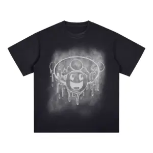 Black acid washed T-shirt with a smiley face sketched on it's front in white .