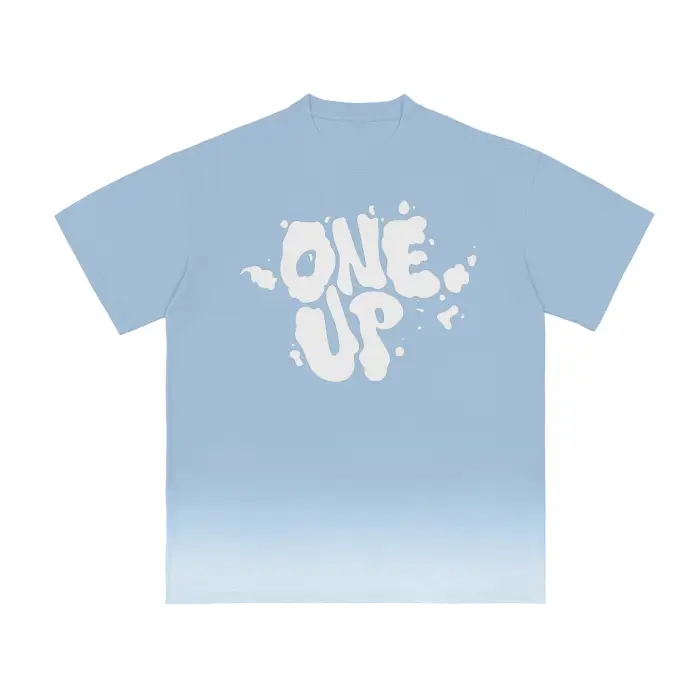 Blue cotton t-shirt witha white gradient from the bottom and a One Up Logo in cloud shaped letters on the front.